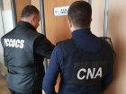 Массовые обыски в городах Молдовы: мошенники отмывали миллионы на яблоках и биткойнах