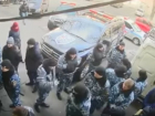 Массовую драку охранников конкурирующих фирм в центре Одессы сняли на видео