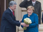 Порошенко рассмешил Запад, повторив на встрече с Меркель ход Путина