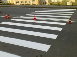 С задержкой в два месяца на дороги столицы всё же начали наносить разметку