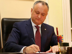 Закон о «болезненной» реформе правительства промульгировал президент Молдовы