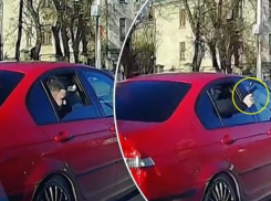 Стало известно, кто дерзко размахивал пистолетом из салона БМВ
