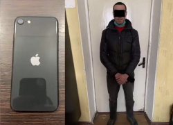 На одной из столичных улиц грабитель вырвал мобильный телефон из рук прохожего 