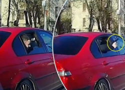 Стало известно, кто дерзко размахивал пистолетом из салона БМВ