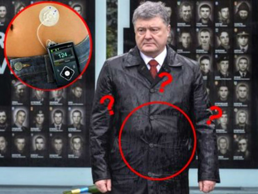 Раскрыта тайна Порошенко: загадочным предметом под плащом оказался не бронежилет