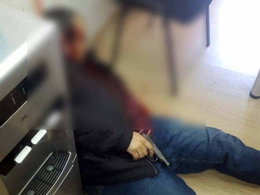 Смертельный выстрел в голову совершил мужчина в офисе кредитной компании из-за долга в 13 000 долларов